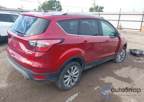 2017 Ford Escape Titanium z USA, uszkodzony, nr VIN 1FMCU9J92HUE25190